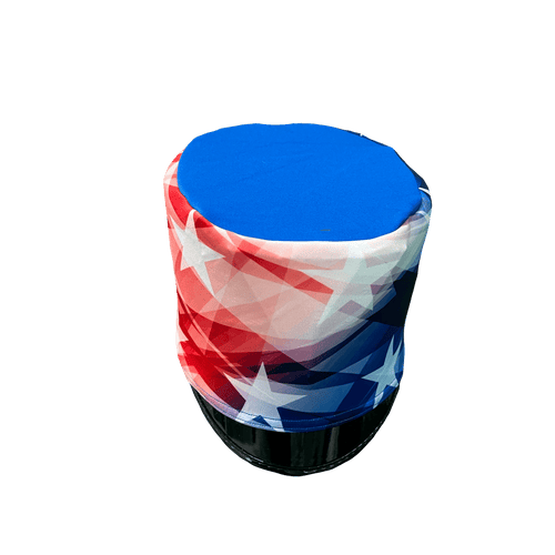 A portable speaker with a geometric pattern featuring stars and stripes, predominantly in red, white, and blue colors.