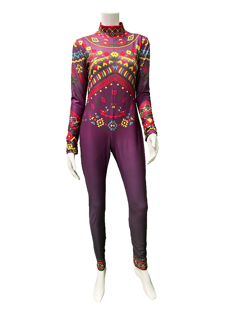 A mannequin wearing a form-fitting Aztec print color guard uniform with long sleeves, predominantly purple with vibrant geometric patterns.