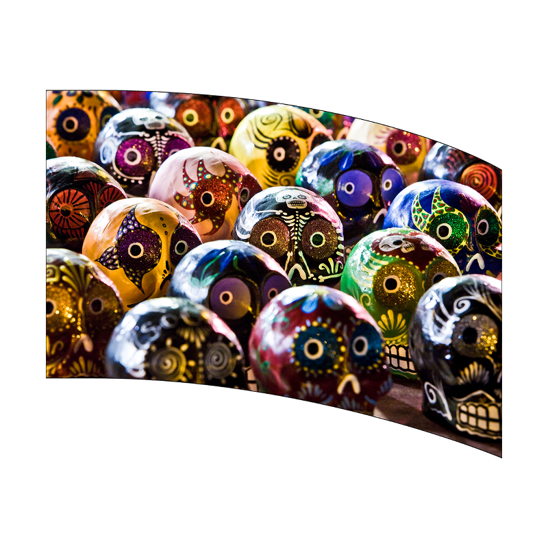 Collection of colorful decorative glass beads on a white background