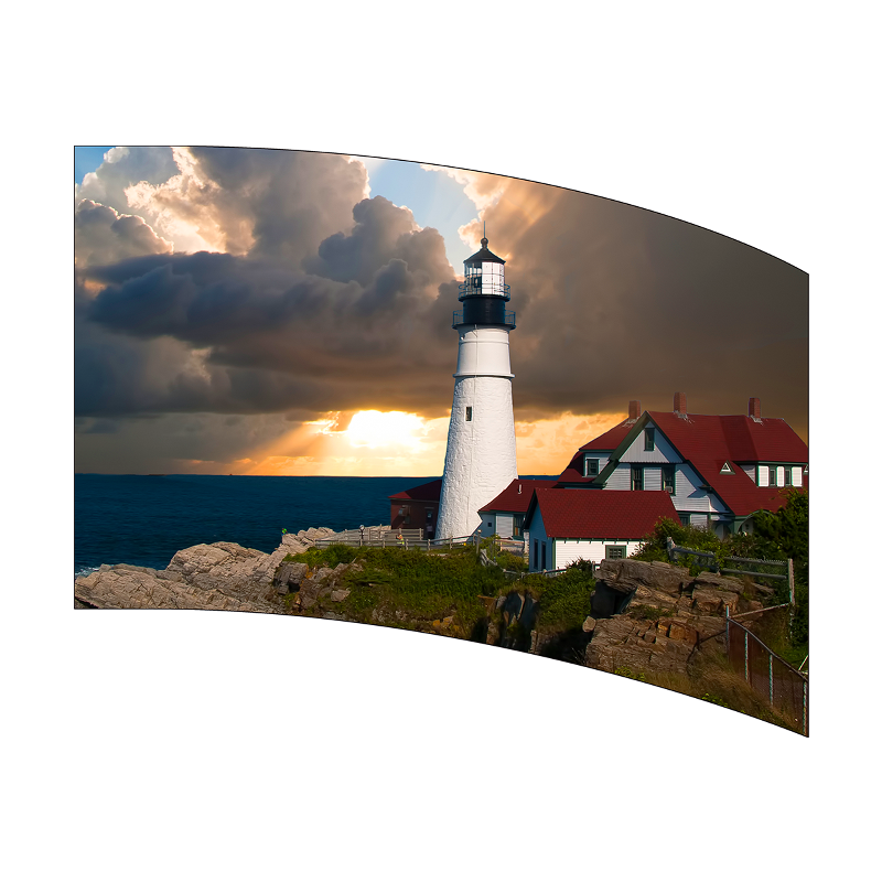 Lighthouse with a cloudy sky and sunset over the ocean