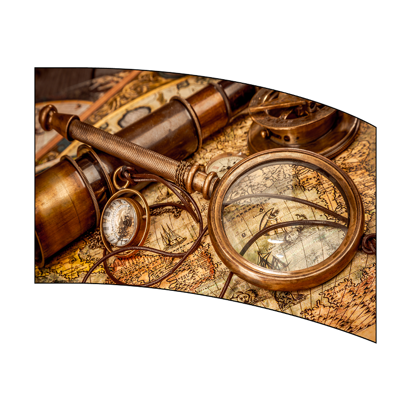 Vintage-style magnifying glass and spyglass on an old world map