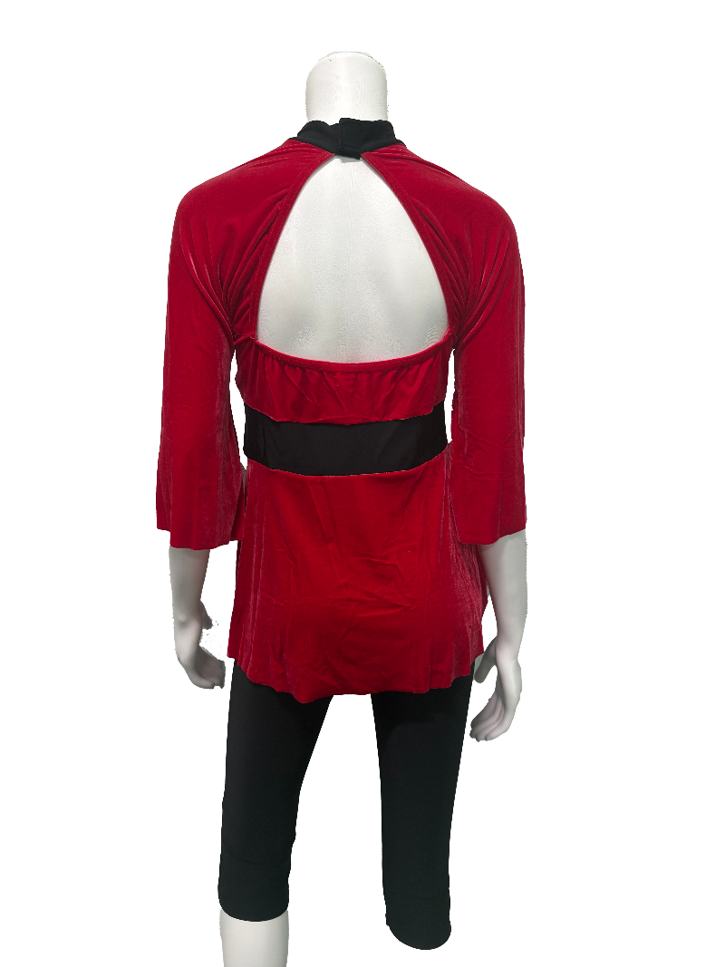 Red top with black accents on a mannequin against a white background