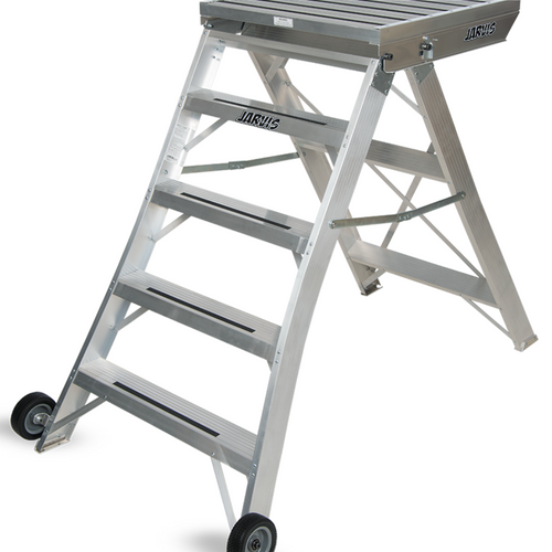 Alternate angle view of Jarvis 52-inch podium Model 10 showing aluminum conductor platform with non-slip surface, ladder-style steps, reinforced cross-bracing, wide stance, and transport wheels for marching band use.