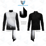 A black and white long-sleeve athletic top shown from the front and back, with a small inset demonstrating a black shako wrap applied to the back hem. The image includes a shield logo at the top and labels indicating FRONT, BACK, and SHAKO WRAP.