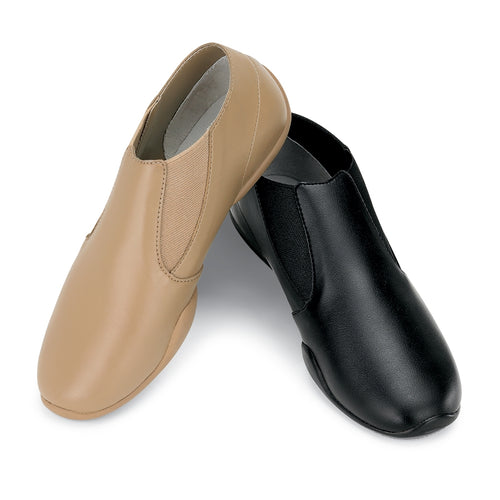 StylePlus Releve slip-on dance shoes shown in beige and black, featuring a smooth leather upper with elastic side panels and flexible low-profile sole, designed for jazz dance, studio practice, rehearsals, and stage performances.