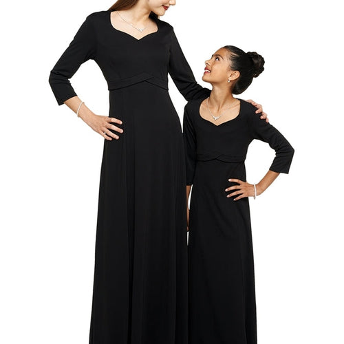 Adult and youth models wearing the Charlotte Heart Shaped Neck 3/4 Sleeve Dress in black, featuring a flattering empire waist and flowing floor-length silhouette, ideal for choir performances, formal events, and coordinated group attire.