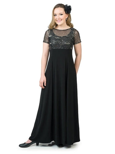 Alison Sequin Boat Neck Short Sleeve Dress featuring a sheer sequin-embellished bodice, elegant boat neckline, and flowing floor-length black skirt, styled for formal events, choir performances, and evening occasions.