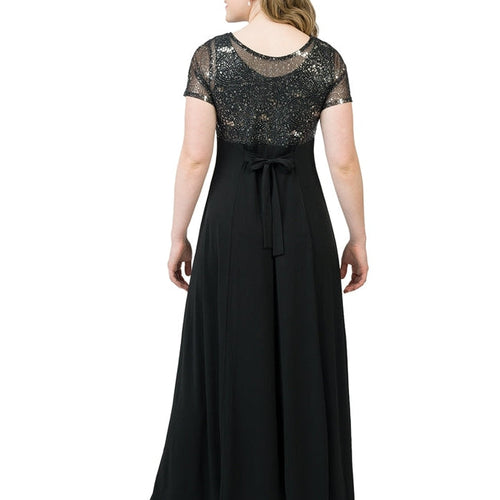 Back view of the Alison Sequin Boat Neck Short Sleeve Dress showcasing a sheer lace-and-sequin bodice, elegant boat neckline, waist tie detail, and flowing floor-length black skirt, ideal for formal events, choir performances, and evening wear.