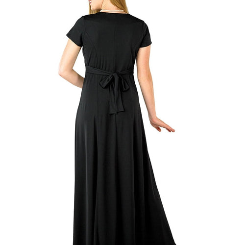 Back view of Chloe sweetheart neck short sleeve youth dress in black, featuring a floor-length A-line silhouette with an adjustable waist tie, designed for youth choir performances, stage recitals, concerts, and formal ensemble wear.