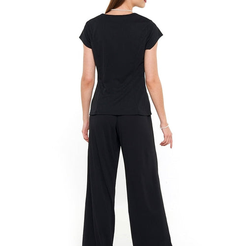 Back view of Britney heart shaped neck cap sleeve blouse in black, showcasing a sleek fitted silhouette with cap sleeves, paired with wide-leg black pants for a polished women’s formal and performance wear outfit.