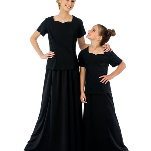 Tatiana floor-length concert skirts in black worn by adult and youth performers, featuring a flowing silhouette paired with matching black concert tops, ideal for choir, recital, and formal stage performances.