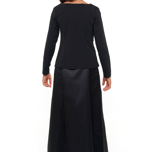 Back view of the Lucy high scoop neck long sleeve blouse in black, showing a clean rear neckline, full-length sleeves, and a structured tailored fit, styled with a long skirt for women’s professional, formal, or uniform wear.