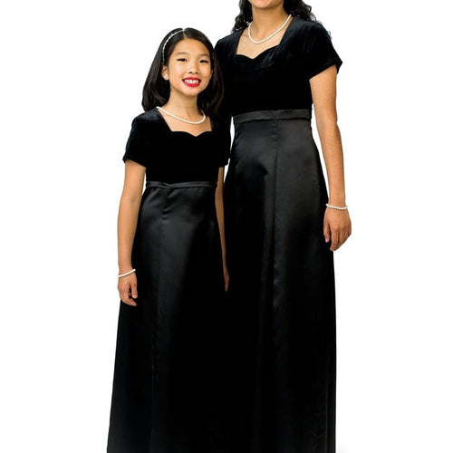 Stephanie Velvet Sweetheart Neck Short Sleeve Dress worn by an adult and child model, featuring a velvet bodice, elegant sweetheart neckline, short sleeves, and a flowing satin skirt—ideal for choir performances, formal recitals, concerts, and coordinated stage ensembles.