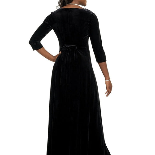 Back view of Sydney velvet scoop neck dress in black, showcasing a soft velvet finish, elegant 3/4 length sleeves, a tied waist detail for a flattering fit, and a flowing floor-length skirt, ideal for formal choir performances, concerts, and stage events.