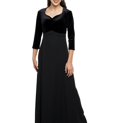 Alexandra Velvet Heart Neck 3/4 Sleeve Dress in black, featuring a fitted velvet bodice with sweetheart neckline, three-quarter sleeves, and a flowing full-length skirt, designed for formal events, show choir performances, and elegant stage appearances.