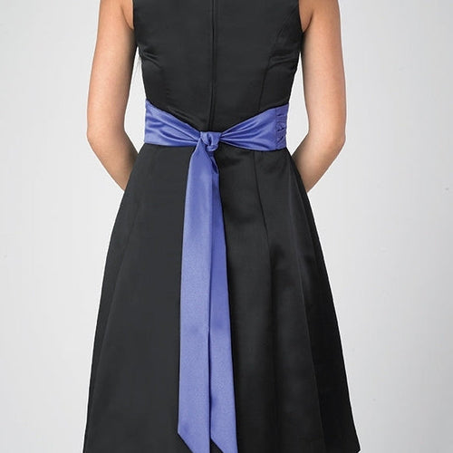 Tanya cummerbund sash in satin blue tied at the back of a black sleeveless performance dress, featuring a smooth waist fit with long flowing tails, ideal for choir uniforms, concert attire, formal stage performances, and dance ensembles.