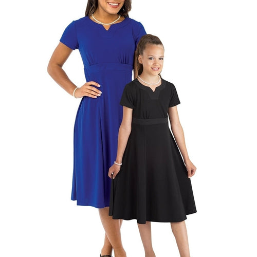 Tori Crew V-Notch Neck Short Sleeve Show Choir Dress worn by adult and youth performers, featuring a flattering A-line silhouette and stage-ready design for choral performances