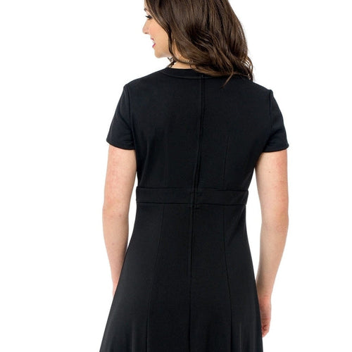 Tori Crew V-Notch Neck short sleeve show choir dress, back view showcasing fitted bodice and flowing A-line skirt in classic black