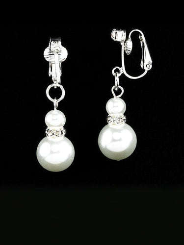 Elegant pearl and diamond clip-on earrings featuring double white pearl drops with sparkling crystal accents, designed for formal wear, choir performances, concerts, recitals, weddings, and special occasions.