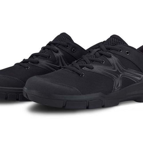 Front angled view of DSI Crossover black marching and performance shoes, featuring a lightweight breathable mesh upper, reinforced toe and heel support, cushioned midsole, and durable non-slip outsole, designed for marching band, show choir, color guard, and extended rehearsal comfort.